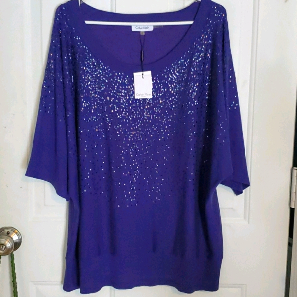 Silk blend sequined sweater.